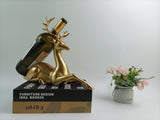 Eleganter goldener Flaschenhalter in Hirschform