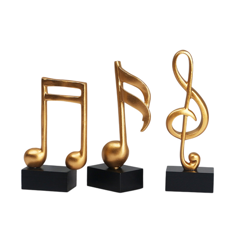 Goldene Musiknoten im 3er-Set auf schwarzem Sockel