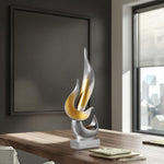 Flammenskulptur in silber mit goldenen Akzenten