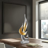 Flammenskulptur in silber mit goldenen Akzenten